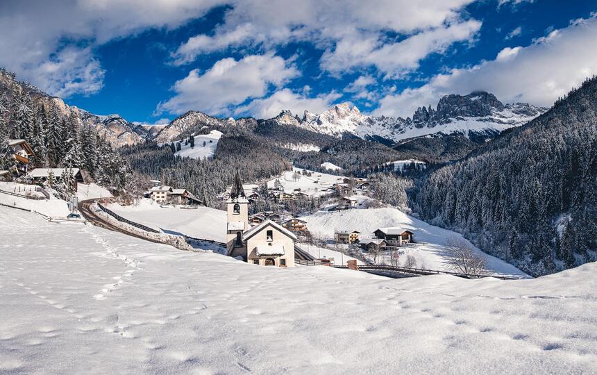 Tiers am Rosengarten is covered in snow