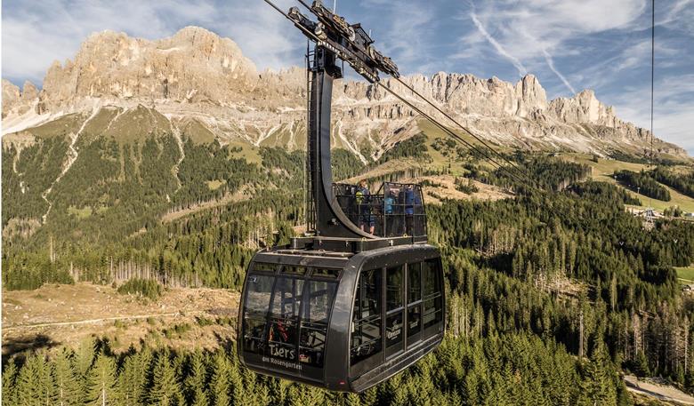 Convertible-style cable car from Tiers to the Rosengarten massif