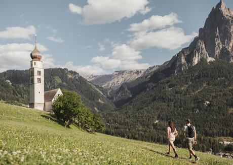 Parish church of Seis am Schlern, with the Dolomites in the background