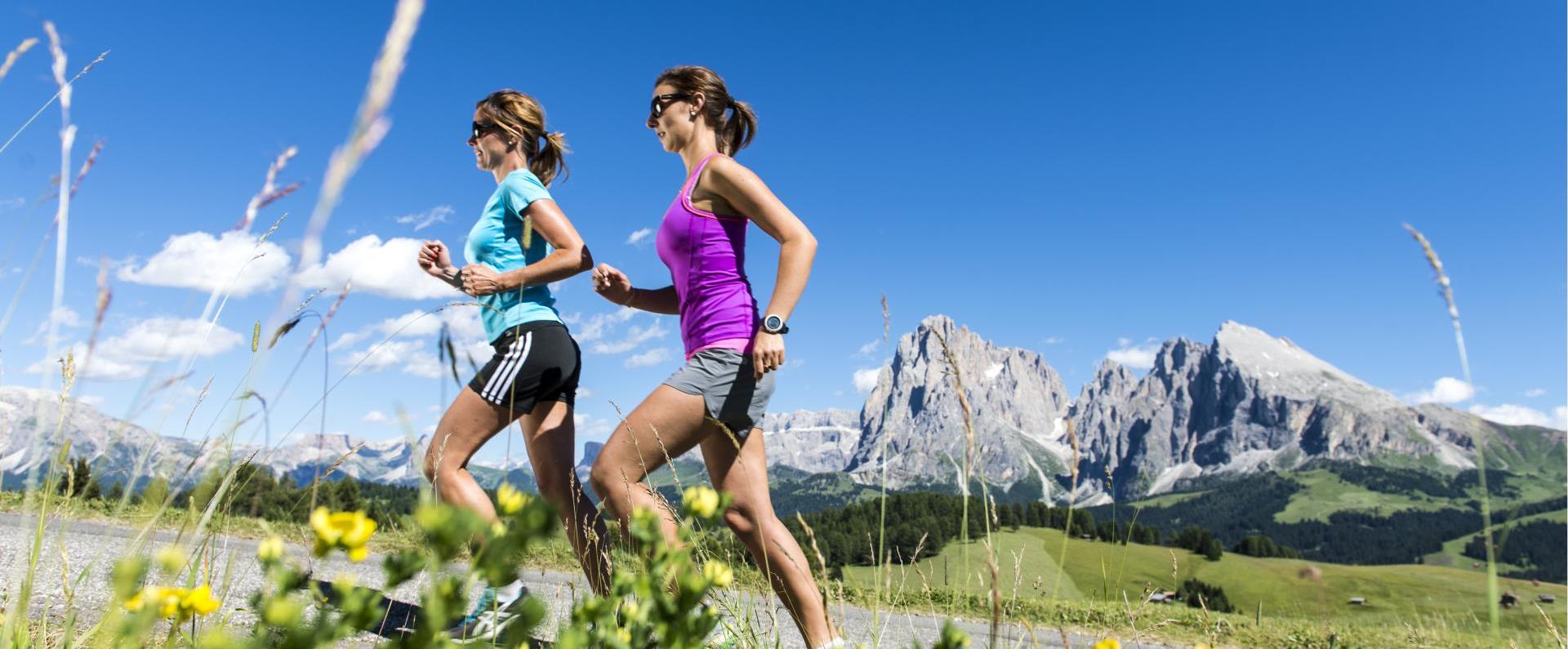 Jogging in the Running Park Seiser Alm in the heart of the Dolomites