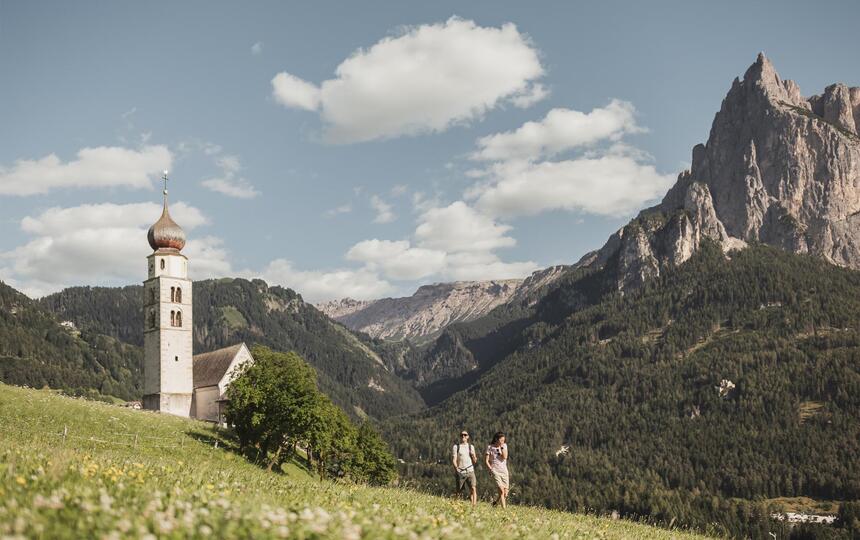 Parish church of Seis am Schlern, with the Dolomites in the background
