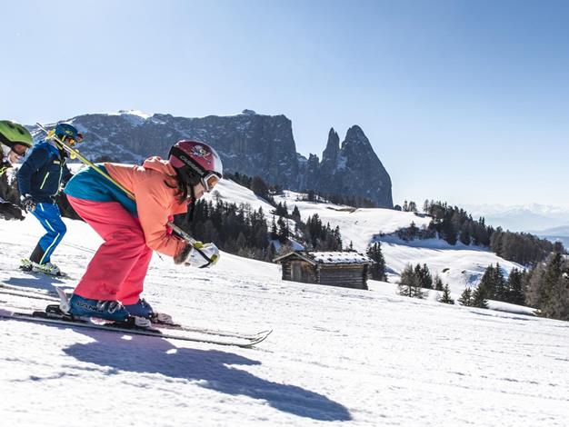 Sciare con i bambini sulle piste perfettamente preparate dell'Alpe di Siusi