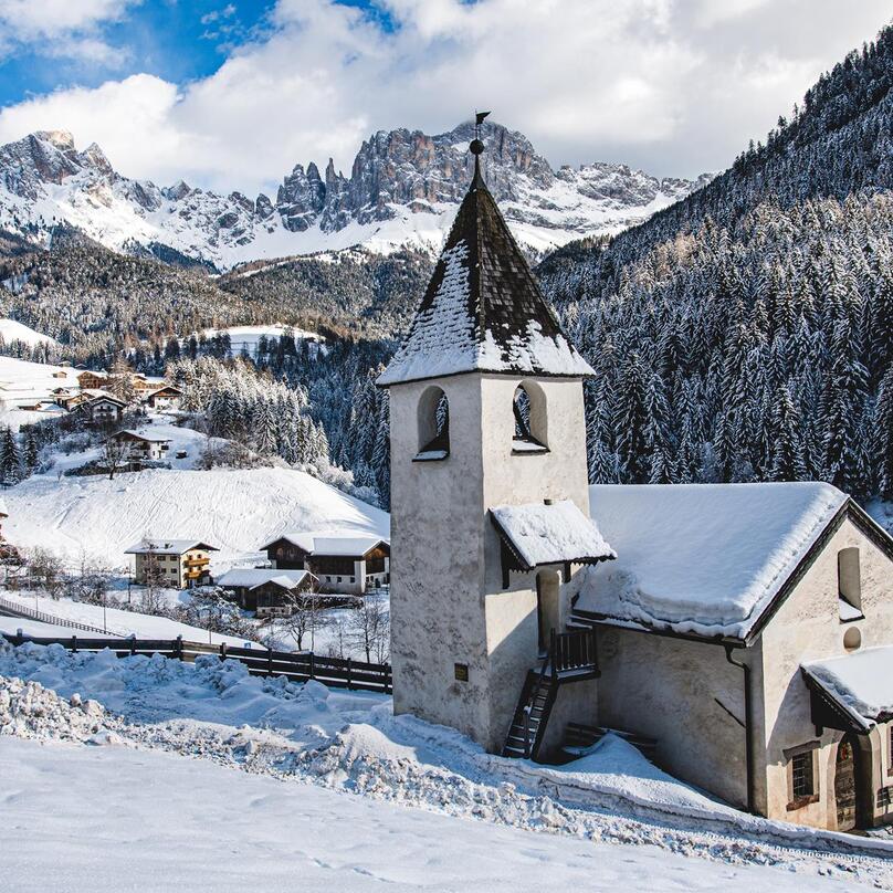 Tiers am Rosengarten is covered in snow