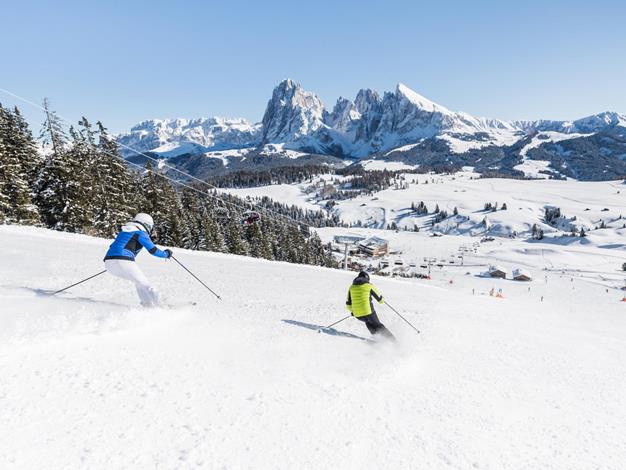 Winter vacation: skiing on the Seiser Alm in the Dolomites