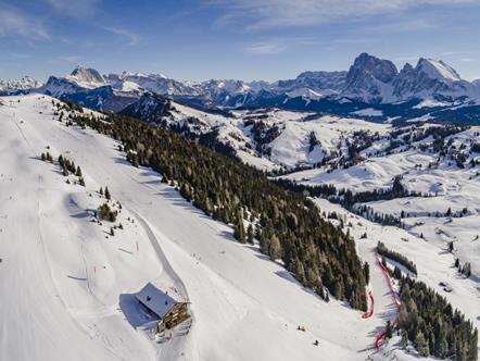 Dolomiti Superski Panorama View of the Alpe di Siusi ski slopes with the Dolomites in the background