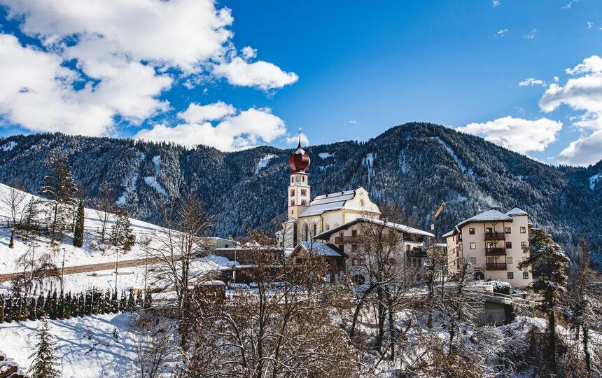 Tiers am Rosengarten is covered in snow