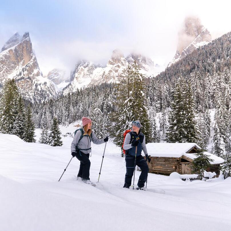 Two people snowshoeing